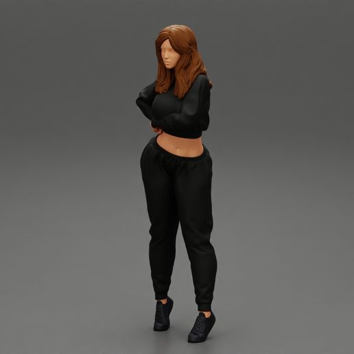 Girl-0006.jpg Mujer joven de pie con ropa deportiva