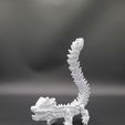 SS_TailLift.jpg Snowstorm, Winter Dragon - Articulated Dragon Snap-Flex Fidget Toy