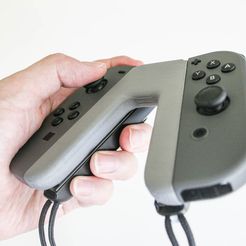 IMG_5413.jpg Nintendo Switch Joy-con Grip (store the strap)