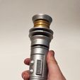 Holding.jpg Shaak Ti's Lightsaber