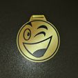 20230727_172232.jpg children's medal with a smiley face