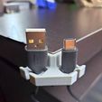 396594343_873548907326334_7109741803379662060_n.jpg The Universal USB Cable Holder