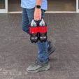 IMG_1205.jpg Bottle Buddy: Universal Soda Bottle Carrier with Ergonomic Handle & Magnetic Storage – Fits Most 1L to 2L Bottles Worldwide