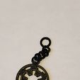 20220510_134014.jpg Empire Symbol Keychain