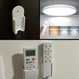 copertina.webp Suporte para controlo remoto de luzes LED: Organize os seus controlos de iluminação com facilidade