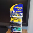 hot-wheels_1195467777.webp Hotwheels Subaru Stand