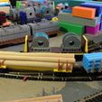 IMG_0913.jpg 50-футовый вагон для бревен/труб в масштабе N с сцепками Micro-Trains
