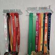 1699303979334.jpg running medal holder