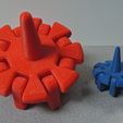 Red and Blue Tops.jpg Spinning Top with Articulated Arms