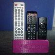c932ceb3-8df5-4f4c-bb2c-f675ff2e6389.jpg Halterung für 3 Fernbedienungen mit Text Holder TV Remote with Text