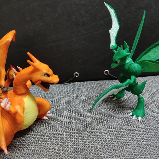 a>2 - an & > See $e LS eH. 4 i SB Gee, : mame s esta peek: us aie acer e ny i STL file Charizard Articulated・3D printable model to download, HalconRojo