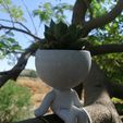 sitting-2.jpg Robert Plant Pot Sitting on Tree