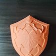 a ee ee Spe a A easier Caer < a, te Wer aserpneRNeRoaanaeD eons aia bel vmake Br os ee ole catia = — claeaia ee Hylian Shield from Zelda Ocarina of Time - Life Size