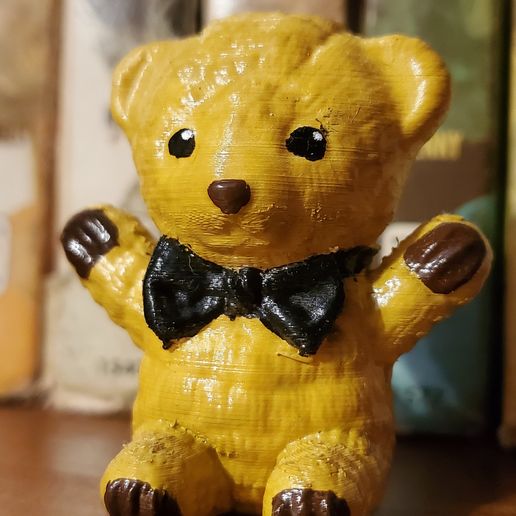 20241219_140828.jpg Cute sitting teddy bear figure.