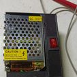 CAUTION ! HIGH VOLTAGE INSIDE DO NOT REMOVE THIS COVER QUALIFIED SERVICE PERSONNEL ONLY 12V power supply box