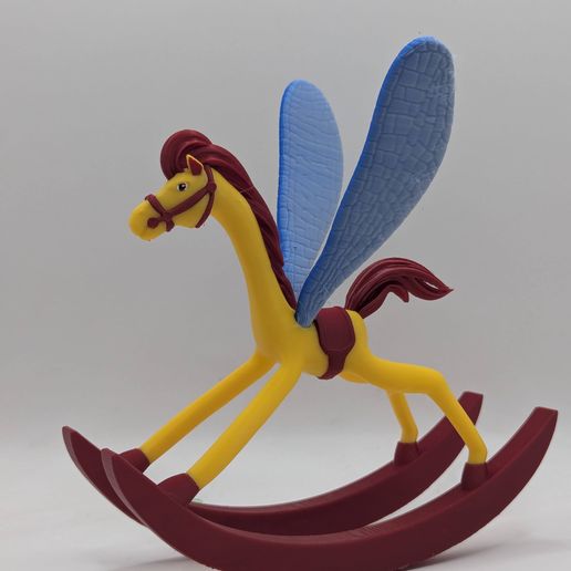 PXL_20260216_203735097.jpg Alice in Wonderland rocking horse figurine