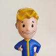 f9a85dbd-8ed9-4a97-9e46-14c8b51e538f.jpg Fallout Vault Boy Charisma Bobble Head
