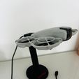 2094e3ee-bc54-4115-94a9-65074fd172ae.jpeg DJI Neo Stand with charging cable