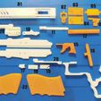 f96b7ffebf6fac2c21dcfc842d62adb5_display_large.jpg Pistola de goma con acción Blowback
