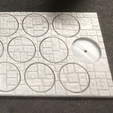 32mm_round_textured_bases_and_movement_tray.png Stonework textured Oval and Round bases and movement trays