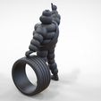 Mim-2.2.6.jpg Michelin man with his tire