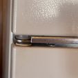 IMG_2620.jpg Old refrigerator door hinge bushing
