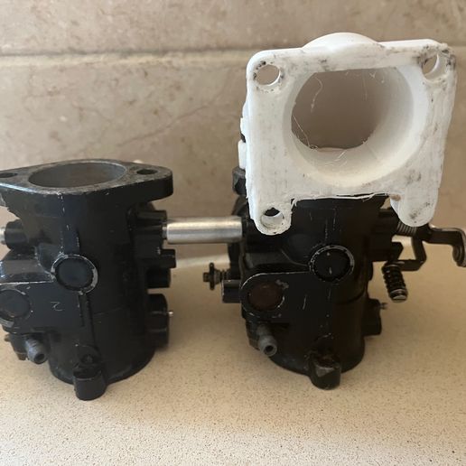 image0-1.jpeg js550 piston port dual carbs intake manifold