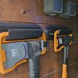 20250903_193030.jpg Fiskars X14 Wall holder and X36 ( after scale )