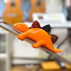 micstandcling.png Guitar Pick Holder - Clings to Microphone Stand! Stegosaurus Guitar Pick Display