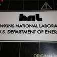 image.png Hawkins National Laboratory gate sign