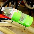 de1767c373e7a678c70a266a3797bf91_display_large.JPG Bicycle water bottle cage with zip-tie attachment