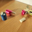 1735215712119.jpg Emergency chewing gum capsule, keychain