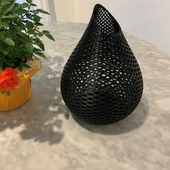 Vase-and-roses.jpg Waterdrop Perforated Vase - Part of the Perforated Décor Collection