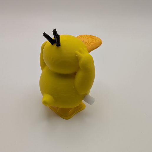 PXL_20250617_163551158.jpg Psyduck Wind Up Walker