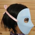 side-view-of-female-mannequin-in-perihelion-moretta-mask-with-pink-ribbon.jpg Moretta/Servetta Muta - Máscara de mascarada veneciana - Perihelion Prints