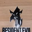 photo1687913396-1.jpeg Resident evil 4 logo