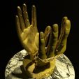 4.jpg golden hand statue 10