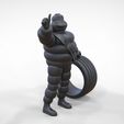 Mim-2.2.12.jpg Michelin man with his tire
