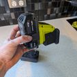 PXL_20260101_054617317.jpg Зарядное устройство Ryobi - настенное крепление