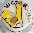 HomeroTorta.jpg Cookie cutter Homer grapping a donut