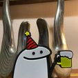 1670509870304.jpg Flork with beer and party hat