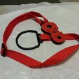 Red_cello_shaped_stop_red_strip_display_large.jpg Cello-shaped cello chair strap stop