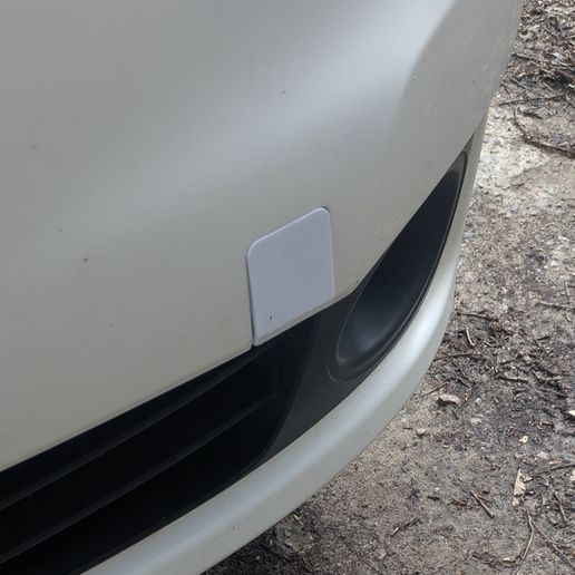 Nissan NV200 tow hook cover