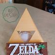 download.jpg ZELDA LINK'S AWAKENING TRIFORCE PHONE STAND, TEALIGHT