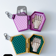 6-floppy-fingers-flexi-hand-closeup.png Flexi Hand Pet in a Coffin Keychain / Multicolor