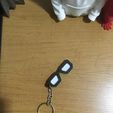 WhatsApp-Image-2026-05-03-at-20.57.12.jpeg The Devil Wears Prada 2 glasses keychain