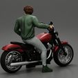 3DG-0004.jpg Young man sitting on his motorbike - Separated and non separated