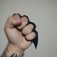 garra.jpg Knuckle Duster - "Non Evades" (High Relief)