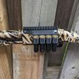 Shell-Holder-With-Rail-3.jpg Mossberg 500/590/835 4x shell holder with picatinny rail (12 Gauge)