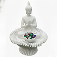 Captura-de-tela-2026-02-01-095203.png Buddha figurine in a lotus flower.